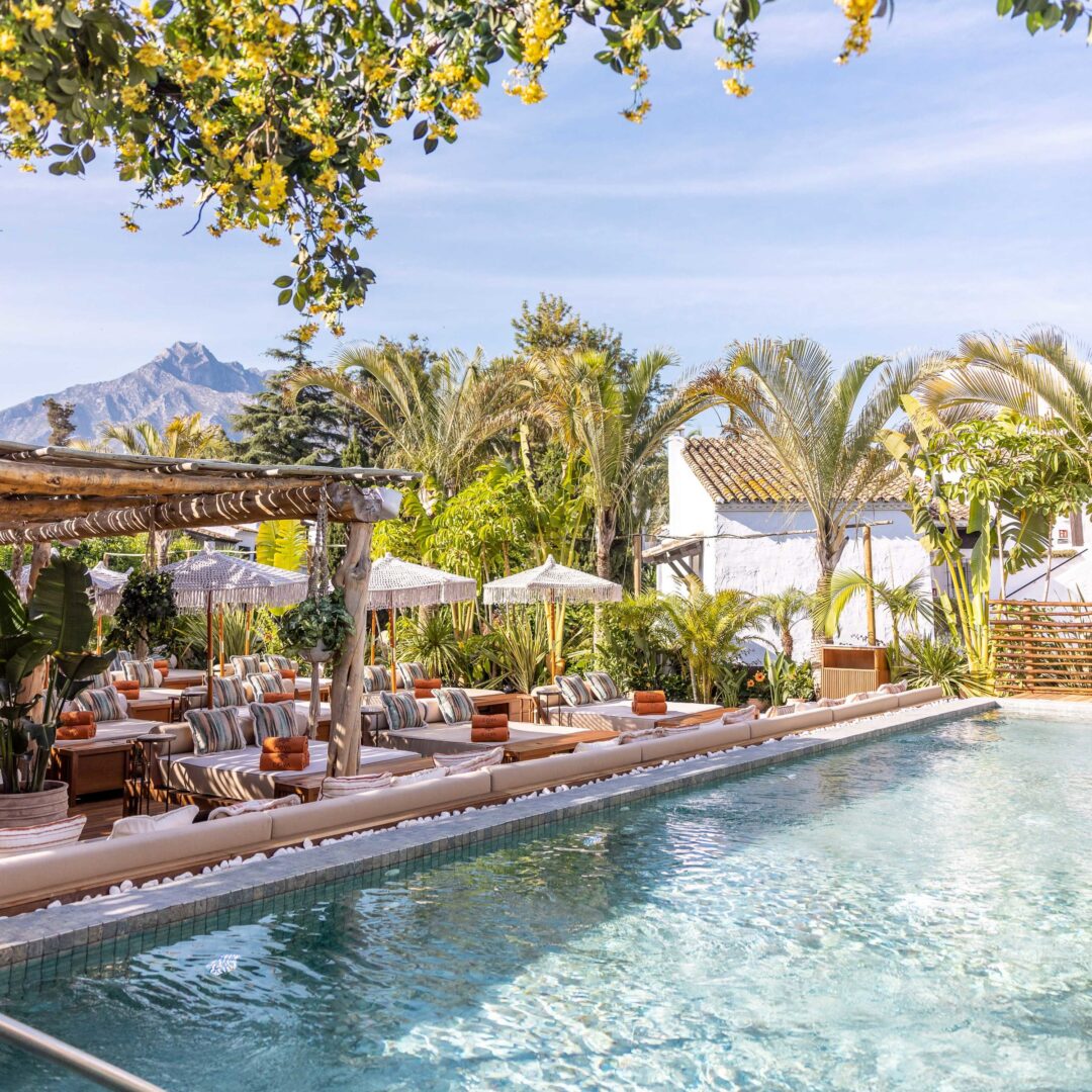 Subtropical gardens at Puente Romano with mountain views